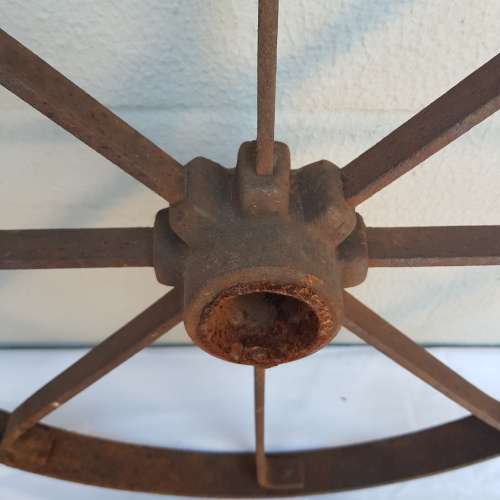 An awesome antique 8-spoke steel wagon/ carriage/ cart wheel