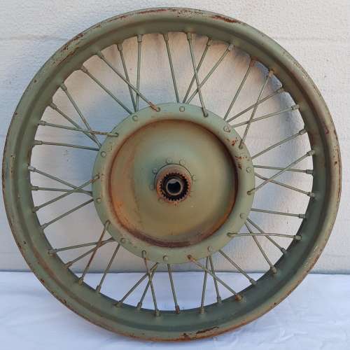 An amazing old antique steel wheel
