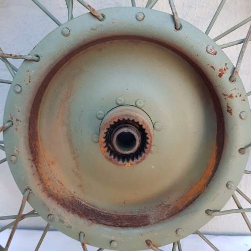 An amazing old antique steel wheel