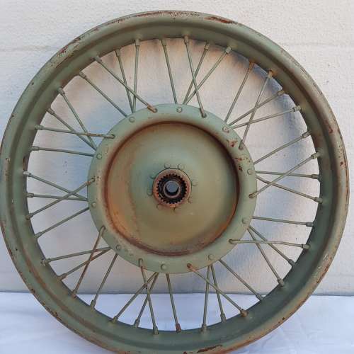 An amazing old antique steel wheel