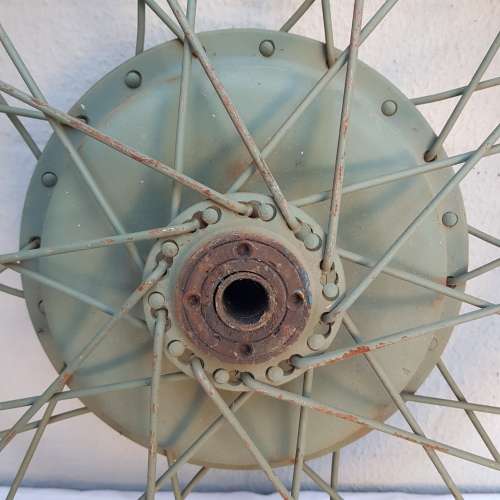 An amazing old antique steel wheel
