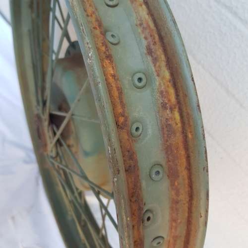 An amazing old antique steel wheel