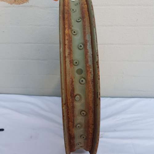 An amazing old antique steel wheel