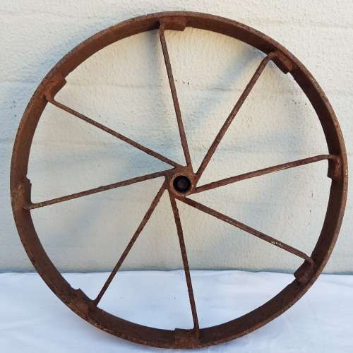 An amazing set of antique 8-spoke steel wagon/ carriage/ cart wheels (1 bid for all 3 wheels)