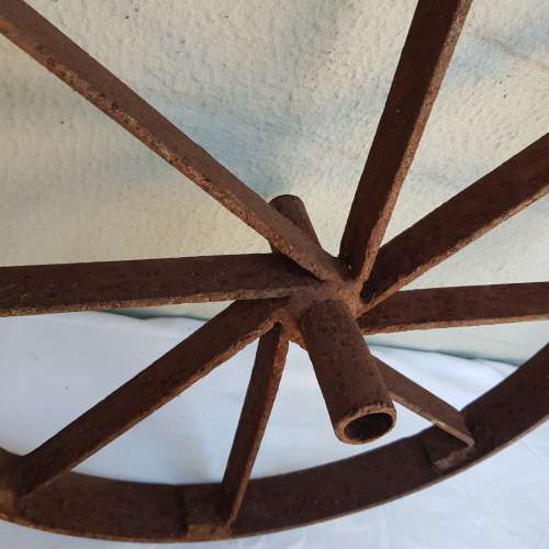 An amazing set of antique 8-spoke steel wagon/ carriage/ cart wheels (1 bid for all 3 wheels)