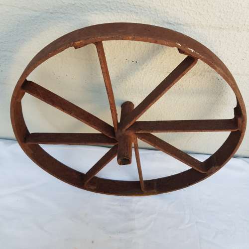 An amazing set of antique 8-spoke steel wagon/ carriage/ cart wheels (1 bid for all 3 wheels)