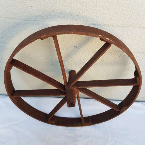 An amazing set of antique 8-spoke steel wagon/ carriage/ cart wheels (1 bid for all 3 wheels)