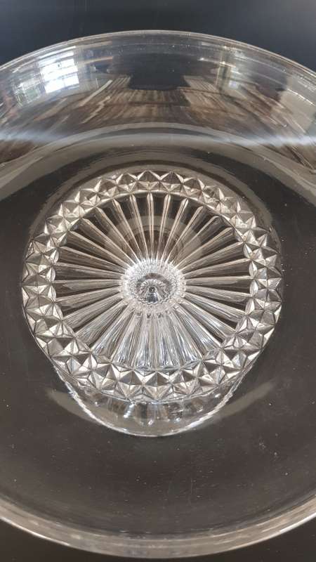 A stunning footed glass centre table fruit bowl