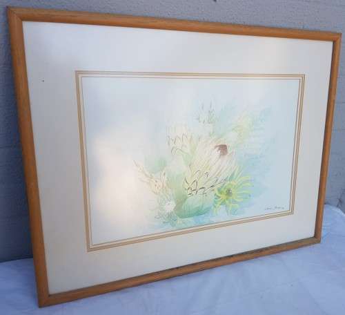 A beautiful Cilliers Burger Protea painting framed behind glass