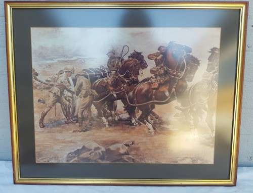 A framed behind glass print of the Boer war