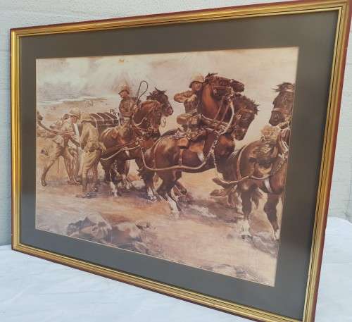 A framed behind glass print of the Boer war