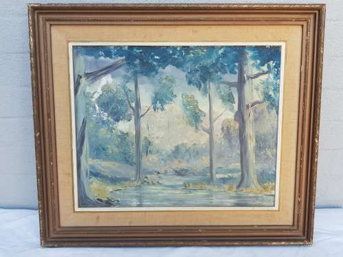 A beautiful framed oil painting of a forrest scene