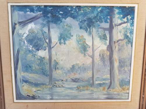 A beautiful framed oil painting of a forrest scene