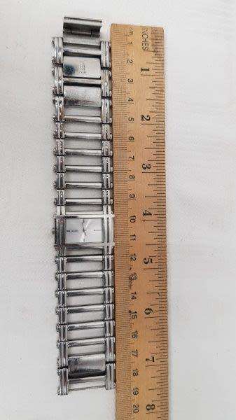 A stunning `GUESS` ladies wrist watch with with a broad strap