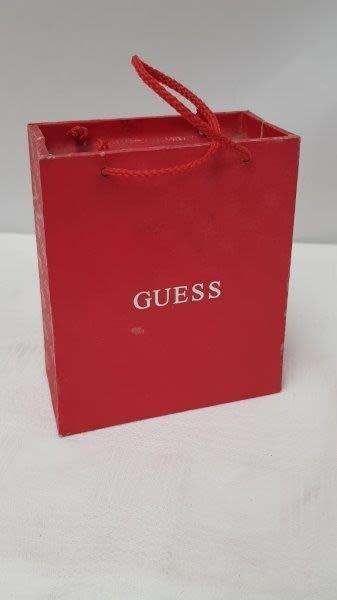 A stunning `GUESS` ladies wrist watch with with a broad strap