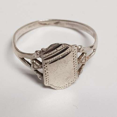 Three pretty stamped silver ladies rings