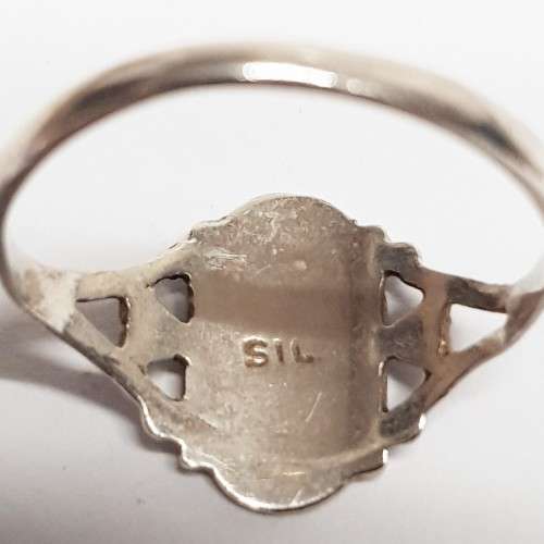 Three pretty stamped silver ladies rings