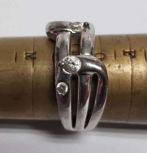 Three pretty stamped silver ladies rings