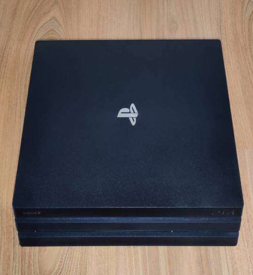 Sony PS4 Pro (UPGRADED to SSD) with charging station + headset stand - Original packaging