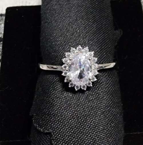***DAZZLING OVAL ZIRCONIA CROWN HALO STERLING SILVER RING***