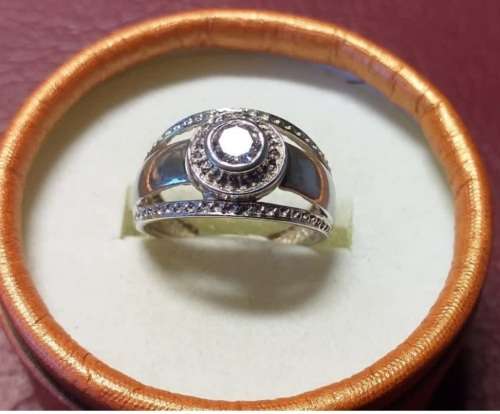 LOVELY GENUINE SOLID STERLING SILVER RING IN EXCELLENT CONDITION.