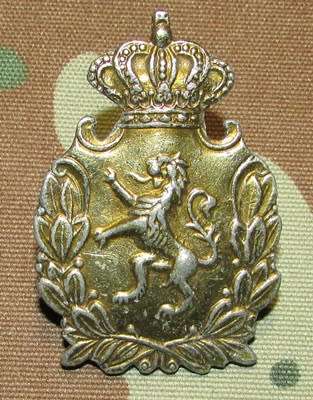 International Cap Badge