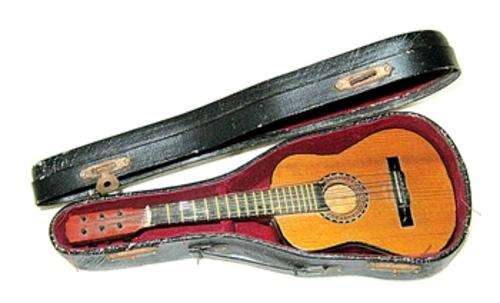 Very Unusual - Holey Moleys Miniature Guitar in Box