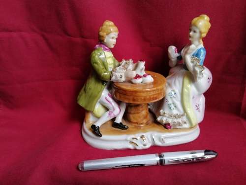 The Leonardo Collection - Fine Porcelain foreign Couple having tea figurine