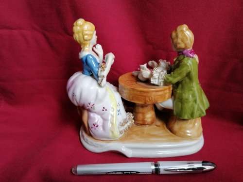 The Leonardo Collection - Fine Porcelain foreign Couple having tea figurine