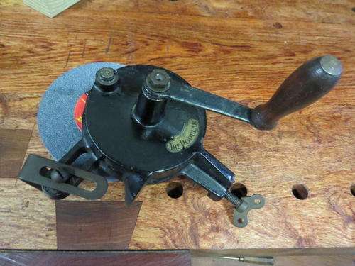 Vintage hand cranked grinder