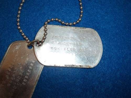 Two Dog Tags To J.J. Schaap