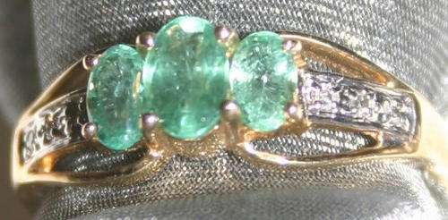 **R7999.00** Drape your Finger in this guaranteed brand new ring contains genuine Diamonds & Emerald