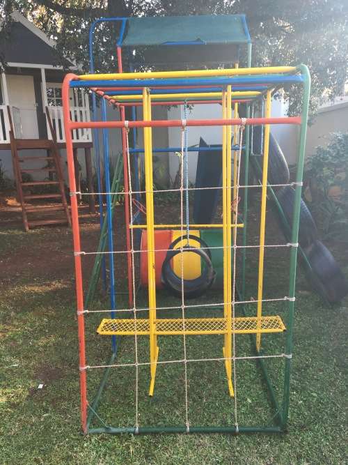Rope climbing wall to monkey bars on top