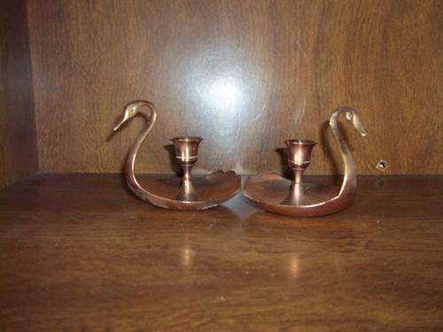 Two beautiful swan candlestick holders -  10 cm high and 12 cm side each