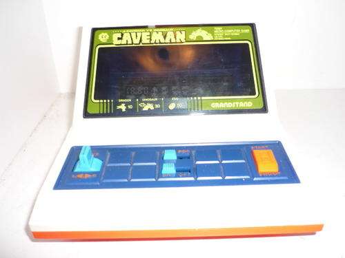 GRANDSTAND CAVE MAN ELECTRONIC MINI ARCADE GAME-1982-ORIGNAL BOX