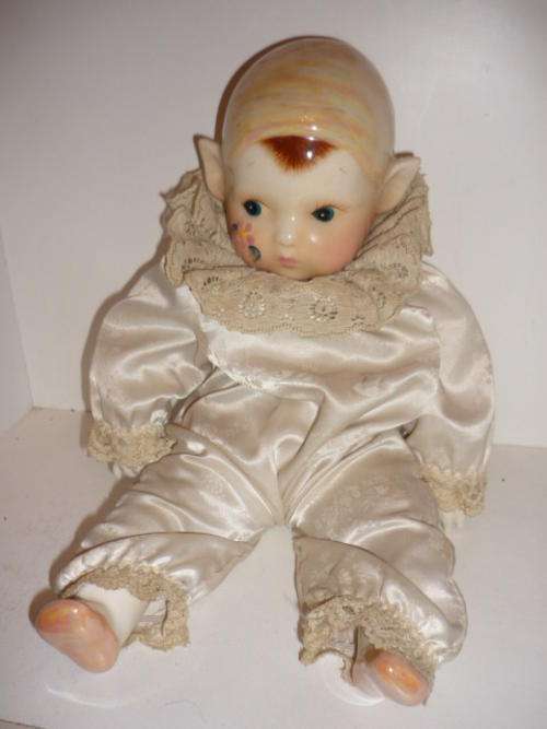 DOLL-STUFFED WITH PORCELAIN HEAD,HANDS AND FEET-37CM TALL-HEAVY