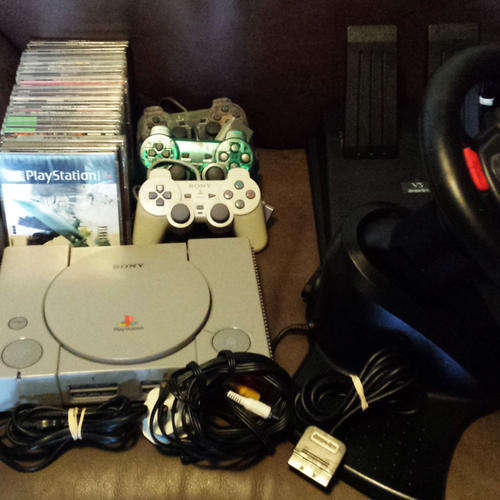 Region free PS1 + 19 NTSC games & accessories