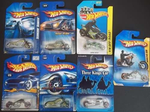 7 X HOTWHEELS  MOTORCYCLES !! DIFFERENT MODELS ! MINT MOTORBIKES IN SEALED UNOPENED PACKAGING !