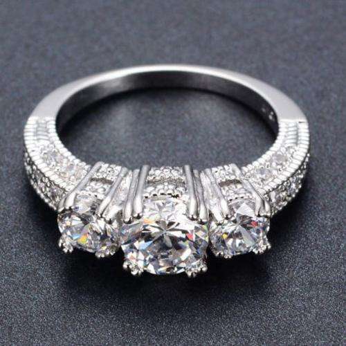 **Stunning 1.25 Carat Sim. Diamond Brilliant Round Trilogy 10K Gold Filled Ring