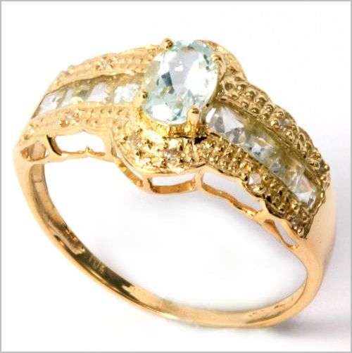 SOLID GOLD!!!.. STYLISH NATURAL BLUE TOPAZ AND DIAMONDS SET IN 10K SOLID GOLD