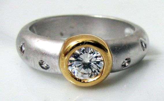 0.65 CTW TWO TONE BRILLIANT CUT DIAMOND ENGAGEMENT RING CLAD IN 18K WHITE + YELLOW GOLD SIZE 4