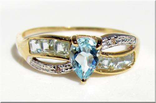 BEAUTIFUL BLUE TOPAZ .....NATURAL GEMS SET IN 10k SOLID GOLD