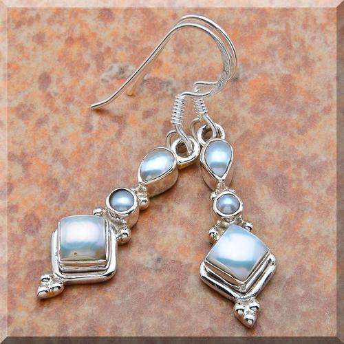 BEAUTIFUL PEARL EARRINGS!!! SET IN SOLID STERLING SILVER