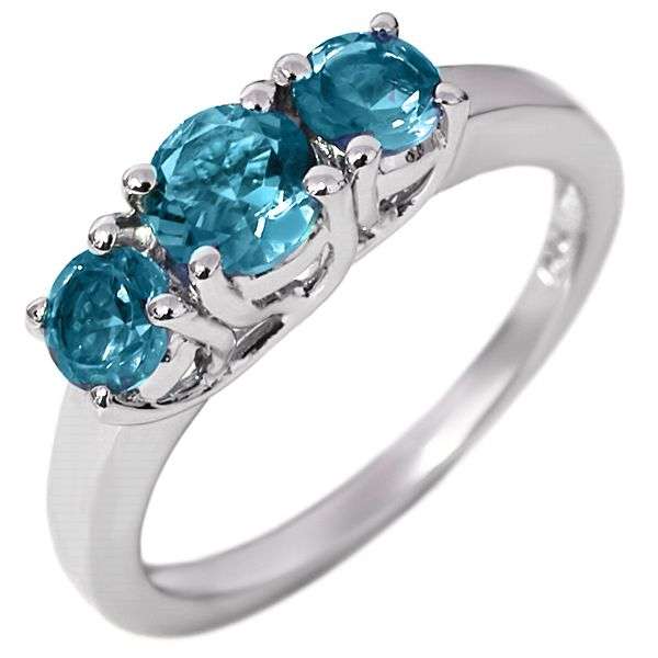 **INTERNATIONAL SHIPPING!!!** NATURAL BLUE TOPAZ IN ELEGANTLY STYLED .925 STERLING SILVER SIZE 8