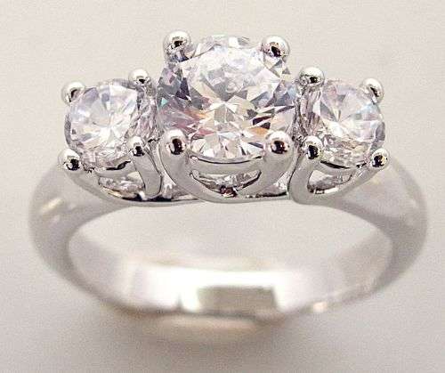 Trilogy of CZ Diamonds set in 18K GP White Gold Ring sz6