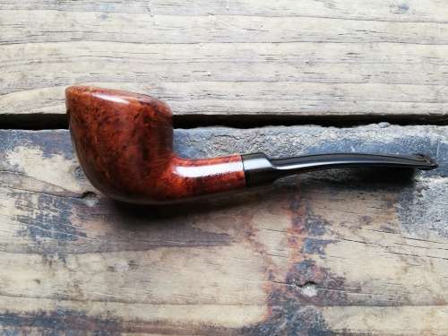 Friend smoking pipe
