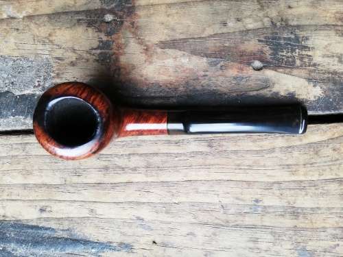 Friend smoking pipe