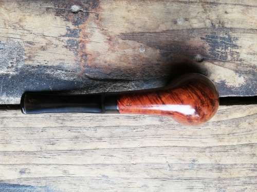 Friend smoking pipe
