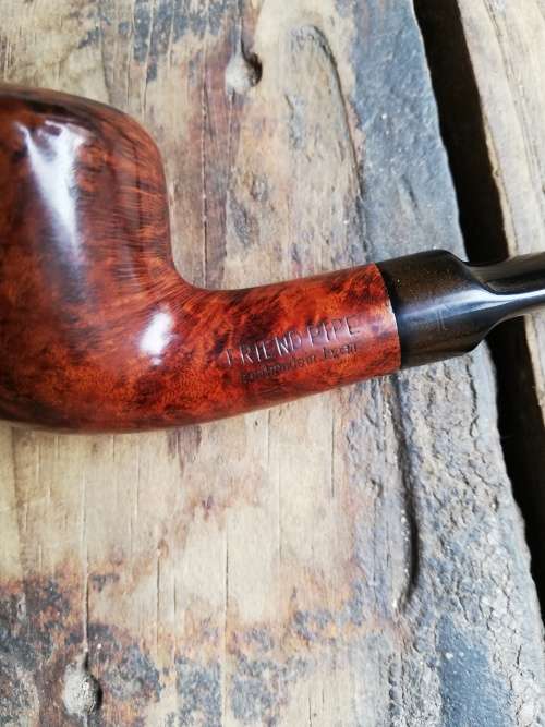 Friend smoking pipe