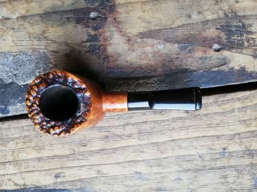 Mario Grandi smoking pipe